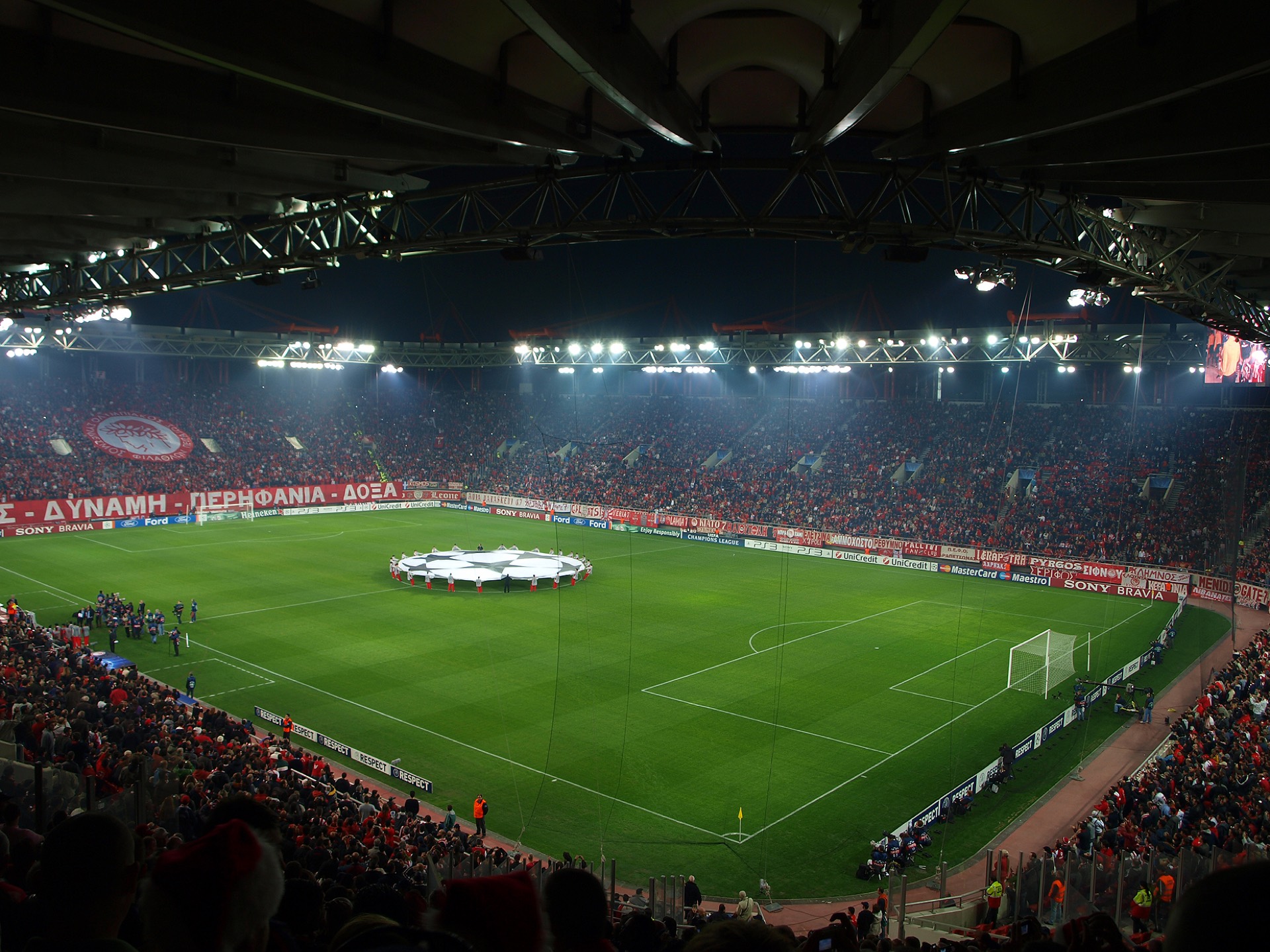 Georgios Karaiskakis Stadium in Piraeus under floodlights