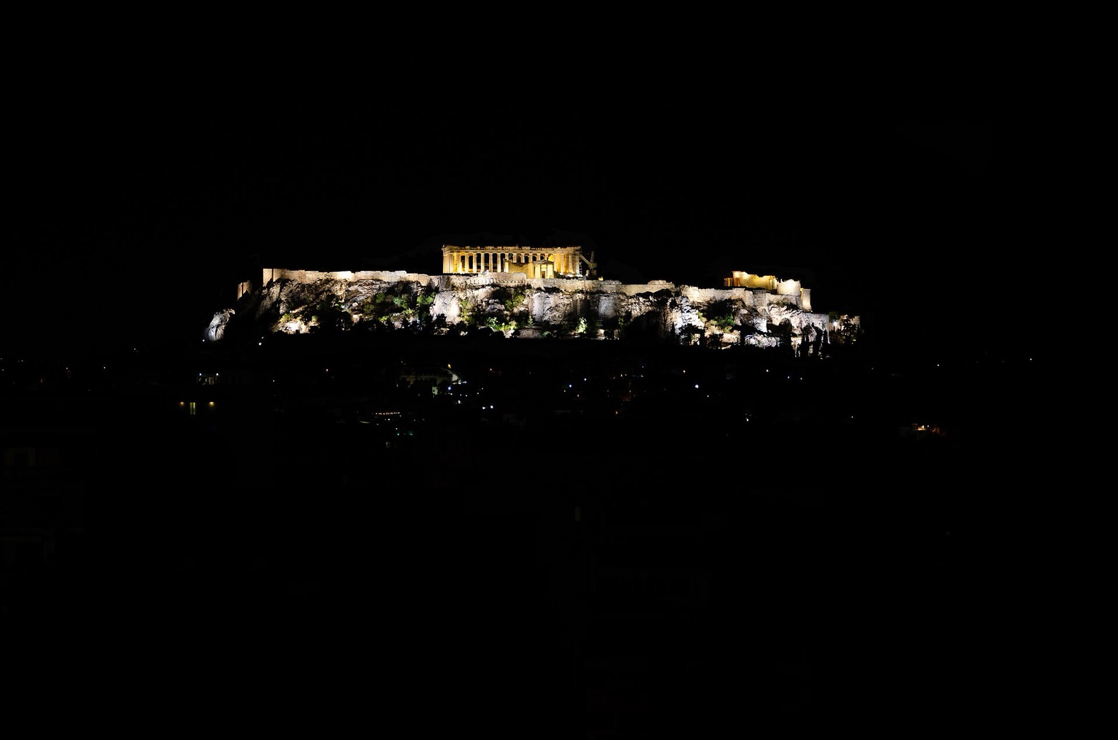 Acropolis and Parthenon lit gold after dark